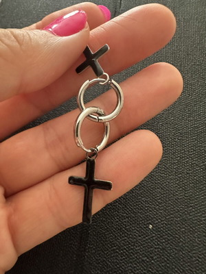 Silver steel huggie earrings with black cross