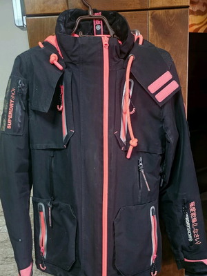 Superdry ski jacket used, size Medium-Large, with fur hood