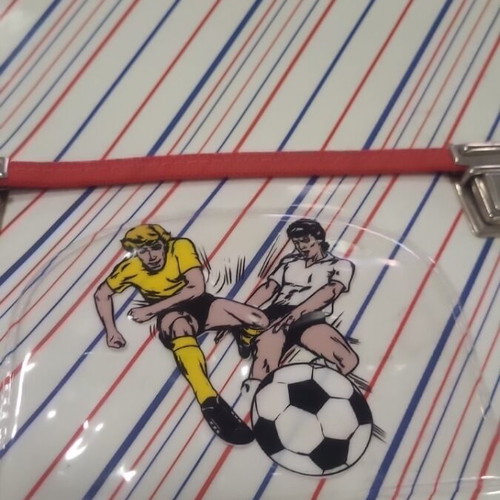 Vintage school bag with retro football design