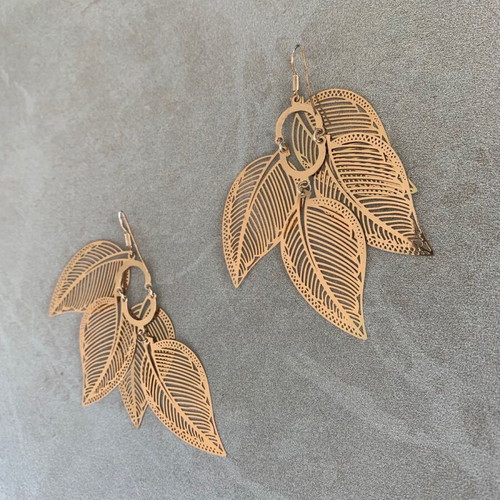Accessorize metal gold feather earrings like new