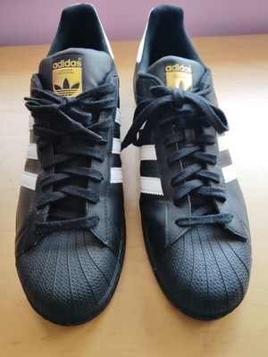 Adidas Superstar sneakers size 52.5, black and gold
