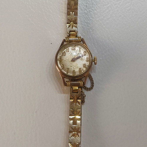 Vintage Swiss Made women's watch, gold plated with safety chain, 20 MC