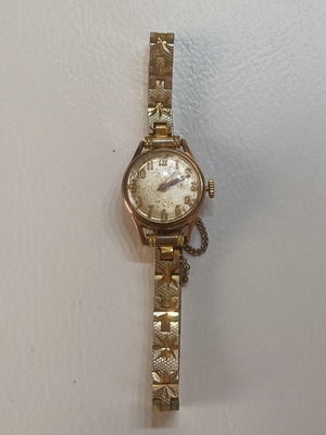 Vintage Swiss Made women's watch, gold plated with safety chain, 20 MC
