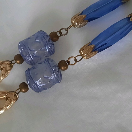 Elegant necklace with a gold-plated chain and beads.