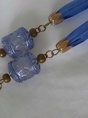 Elegant necklace with a gold-plated chain and beads.