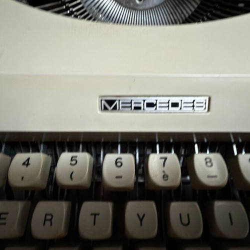 Mercedes vintage mechanical typewriter with original case