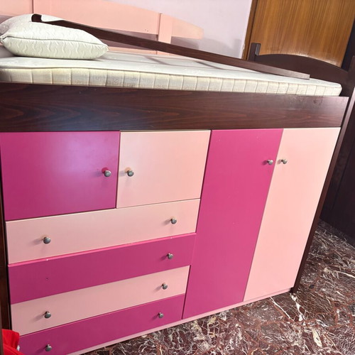 Loft bed used with storage cabinets and hidden desk
