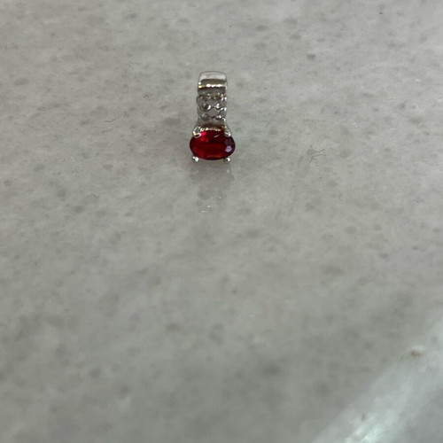 Silver pendant new with zircon