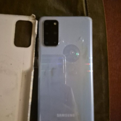 Samsung S20 used blue phone with 2 cases