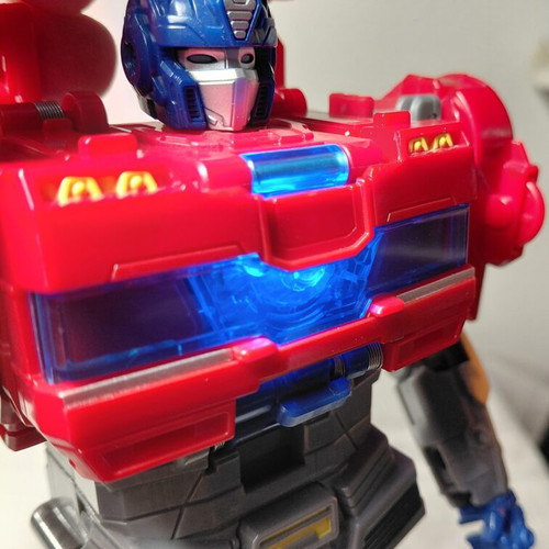 Transformers One Power Flip Optimus Prime Hasbro used, missing parts, light works