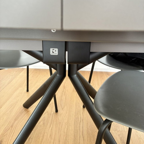 Calligaris Extendable Dining Set with Ceramic Surface and 4 Chairs like new
