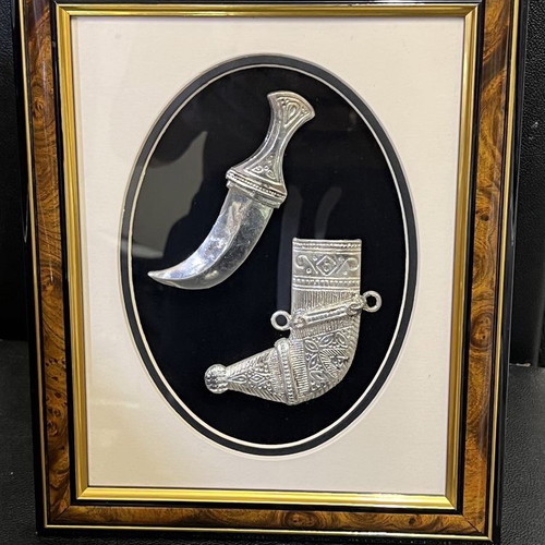 Yemeni dagger in frame used, with sword and sheath