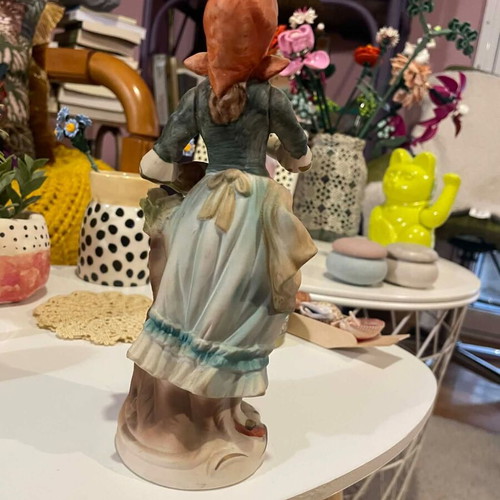 Porcelain decorative figurine of a girl with matte finish like new