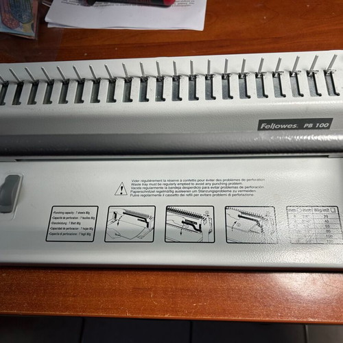Fellowes PB100 binding machine used, 7-sheet punching, 16mm spiral