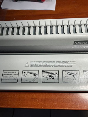 Fellowes PB100 binding machine used, 7-sheet punching, 16mm spiral