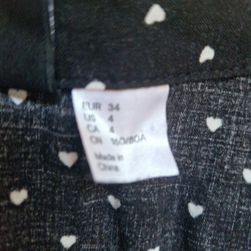 H&M mini button-up dress, black with white hearts