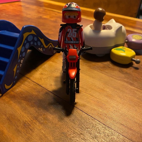 Playmobil playground set with train and motorcyclist like new