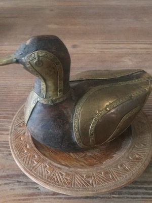 Vintage wooden and brass duck with carved wooden plate