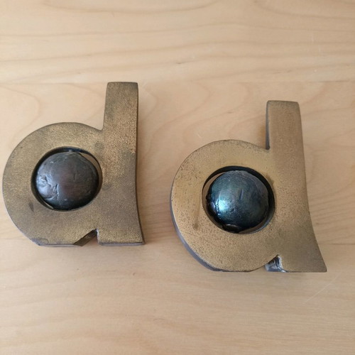 Set of two used bronze decorative items with globe