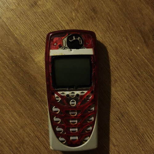Nokia 8310 phone, red, for repair or parts