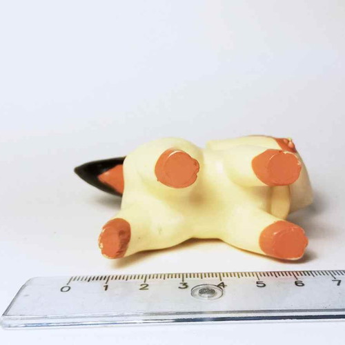 Sagwa plastic figure used with scratches and marks