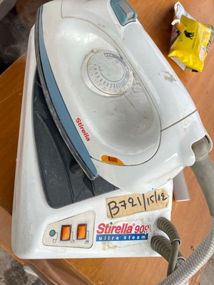 Stirella 900 ironing system used with rich steam