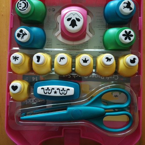 Craft punch set with 13 designs and scissors, like new