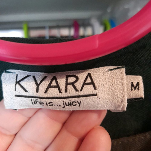 Kyara Plus shirt size M used, cypress green