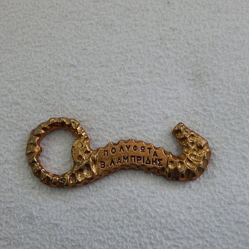 Polyfota V. Lampridis metal promotional bottle opener from 1960s like new