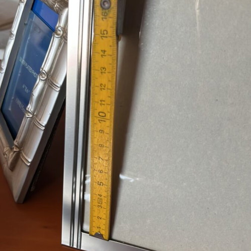 Set of 4 photo frames and 1 small album