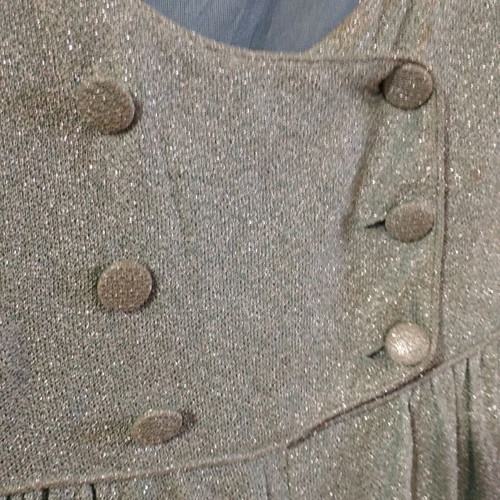 Vintage dress used with silver thread and subtle signs of wear