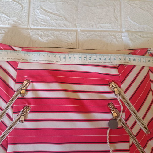 Relish skirt size 42 like new, orange with decorative zippers