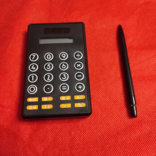 4-in-1 Pocket Calculator new vintage with key holder and flashlight