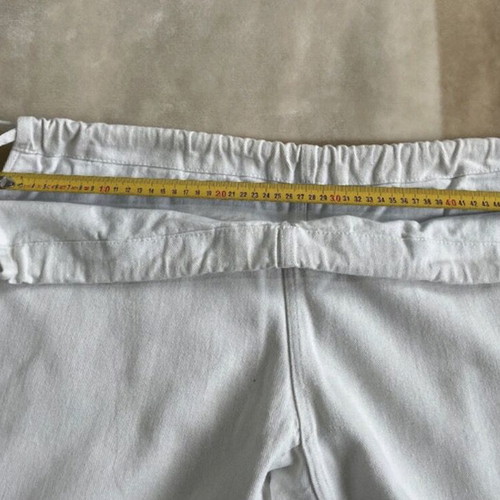 Martial arts pants used with white and yellow belt for adults