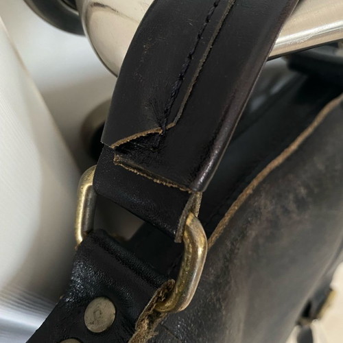 Leather messenger style backpack used, black