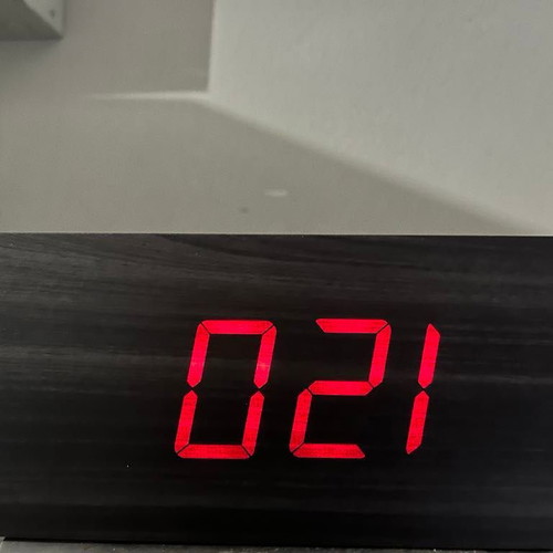 Digital table clock with alarm and radio
