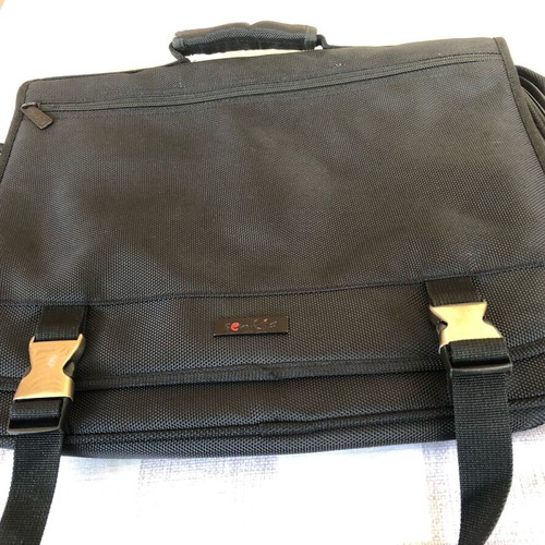 Bag black new with 4 inner pockets for travel and office use