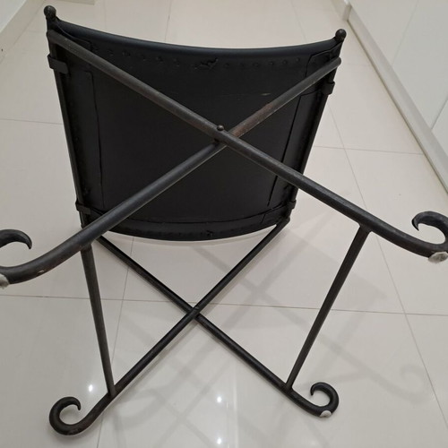 Leather footstool like new, black with cast iron frame