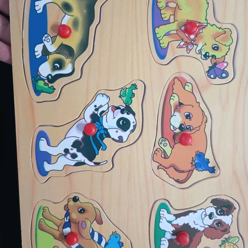 Wooden puzzle with puppies like new