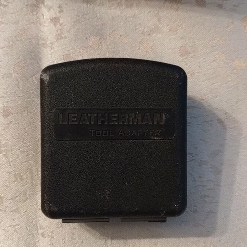 Leatherman multitool and tool adapter like new