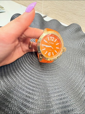Loisir women's wristwatch like new, orange and gold