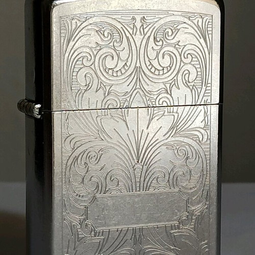 Zippo vintage lighter 2003, new, embossed design