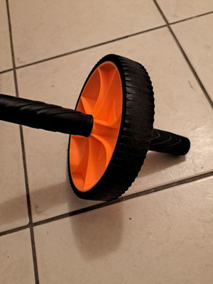 Ab Wheel used with non-slip resistance band for abs workout