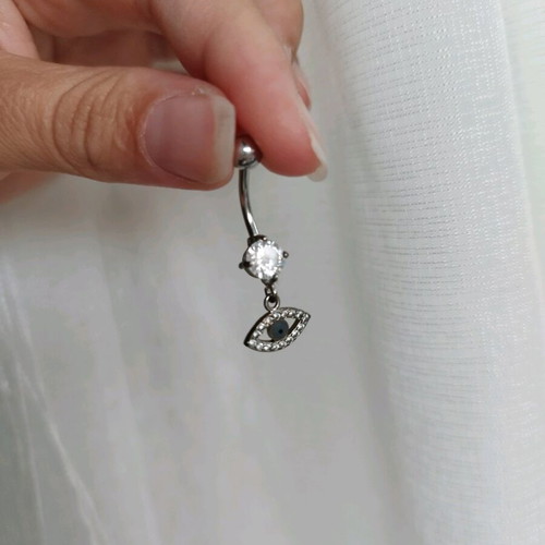Navel piercing like new with eye charm and silver diamond