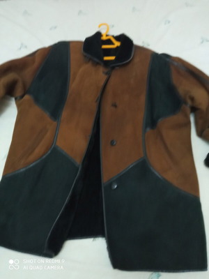 Coat genuine leather with fur inside like new, size XL