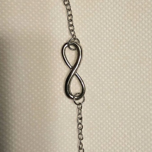 Hoop earrings and infinity bracelet like new, silver