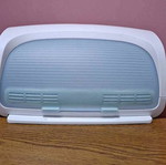 Tupperware bread box new with integrated cutting board