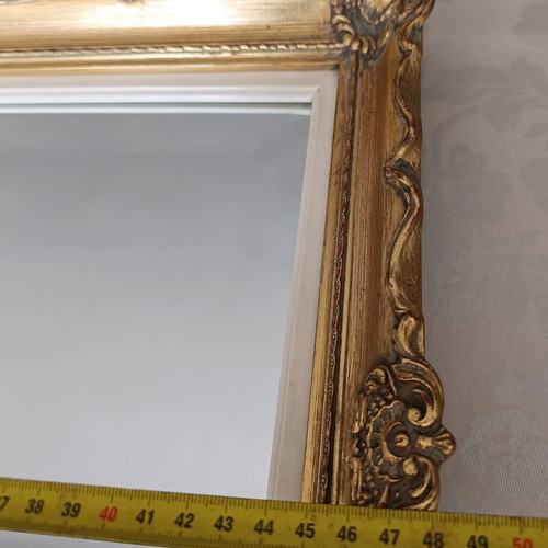 Bijouterie rectangular mirror with carved gilded frame, like new