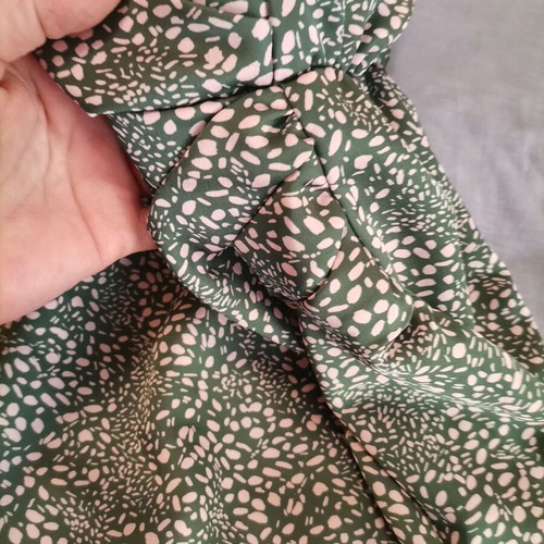 Dress like new in olive color, empire cut and crossover style