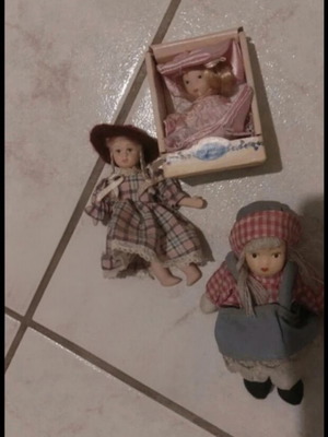 Porcelain dolls set of 3 used, one with detached feet
